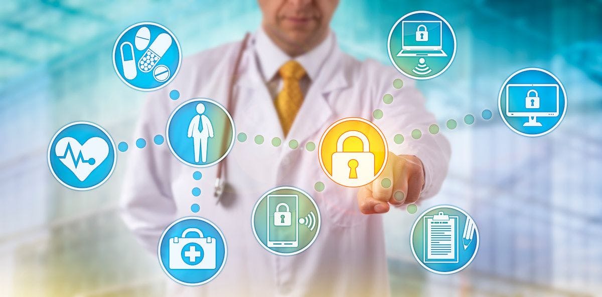 doctor securing data across networked devices: © leowolfert - stock.adobe.com