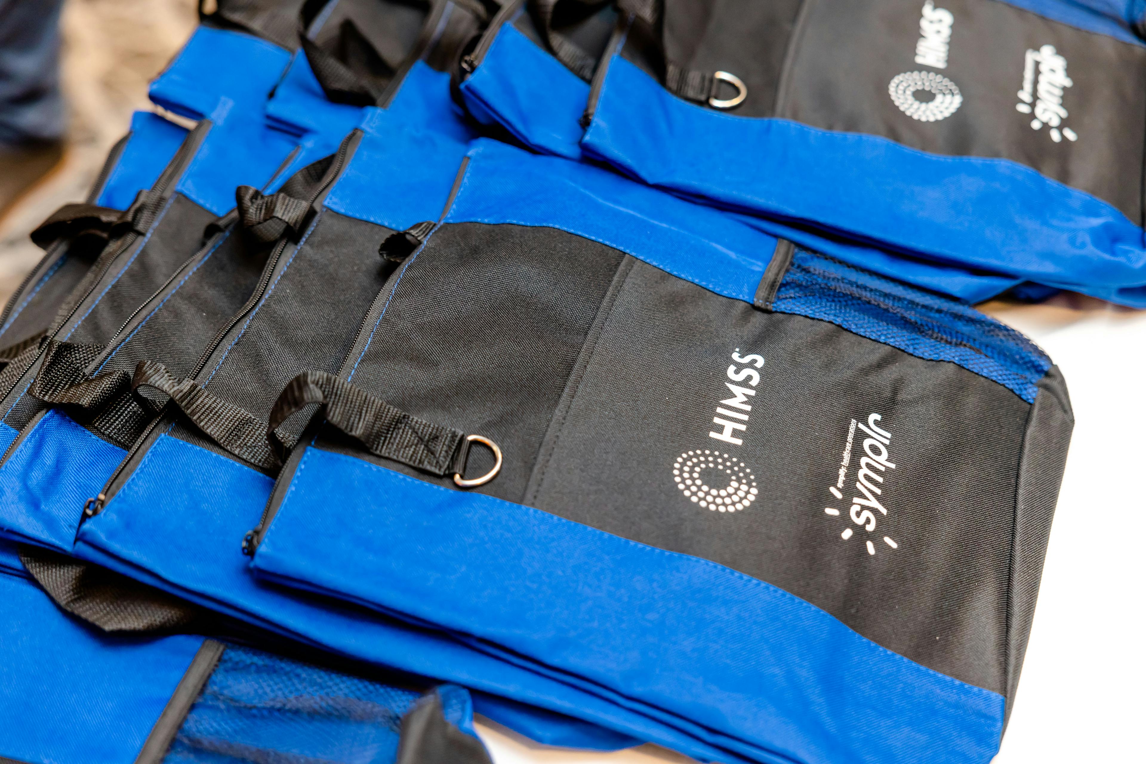HIMSS Bags Courtesy of HIMSS | © Lotus Eyes Photography