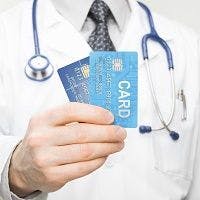 doctor with credit cards