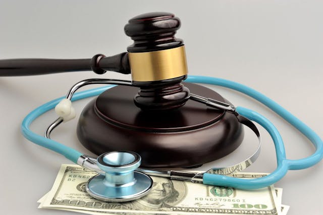 health fraud gavel money stethoscope: © alexstr - stock.adobe.com