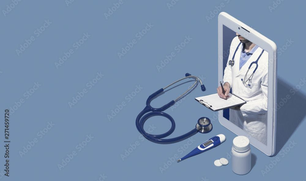 Image of doctor on electronic tablet writing on clipboard ©stokkete-stock.adobe.com