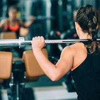 Woman weightlifting at gym