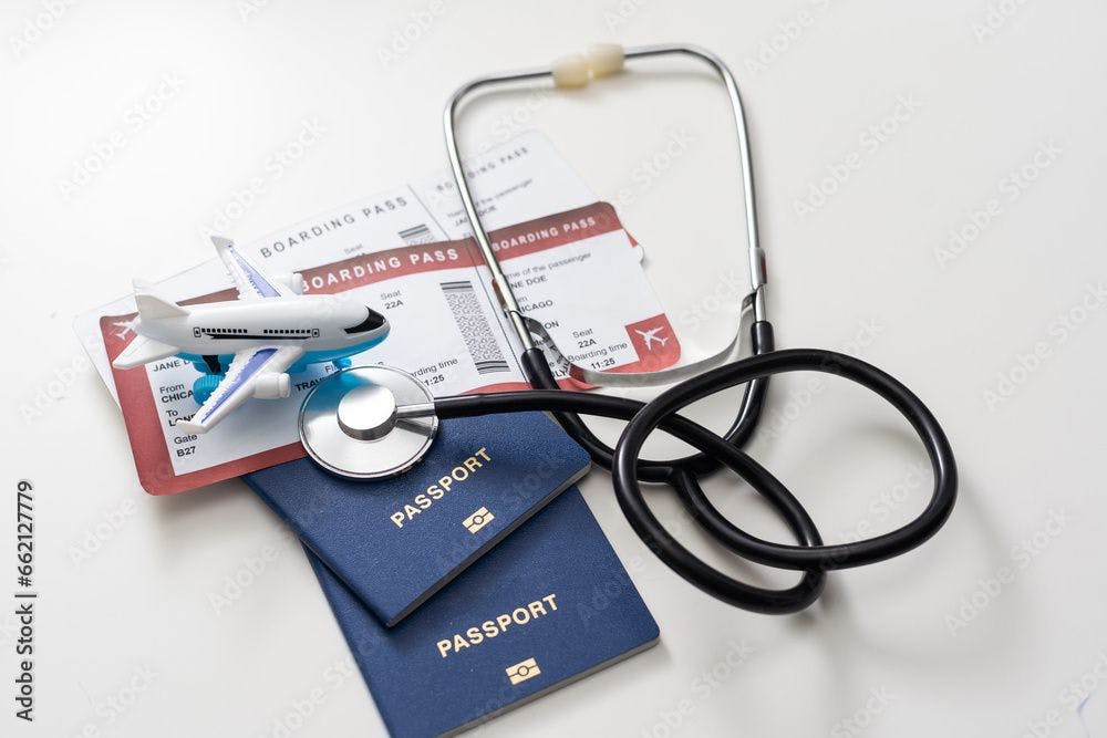 stethoscope laid on travel documents ©Angelov-stock.adobe.com