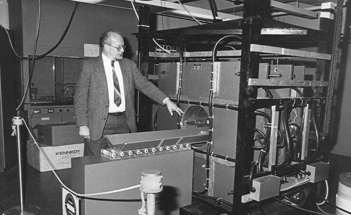 Paul C. Lauterbur with a replica of his original machine, on display in the lobby of the State University of New York at Stony Brook Department of Chemistry. Image Credit: Stony Brook University