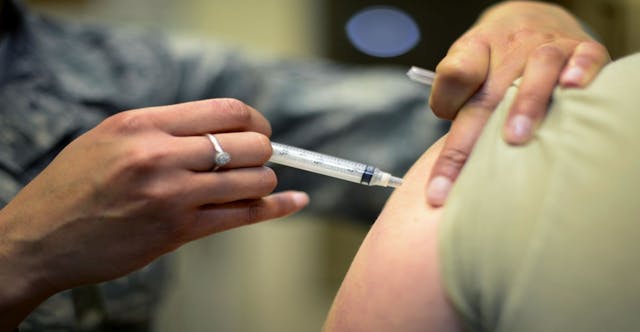 Is vaccination compliance related to sexual orientation?