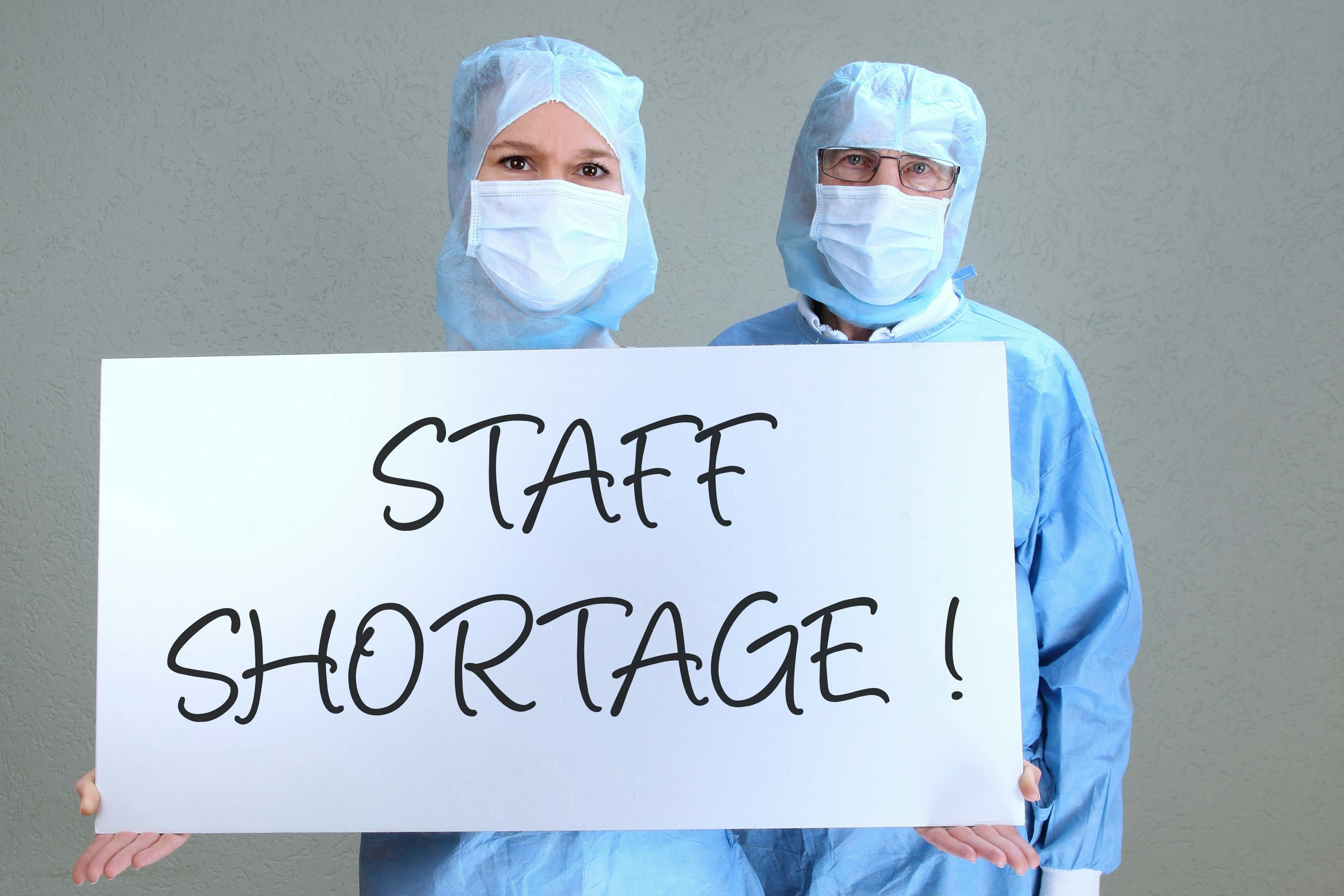 Doctors displaying staff shortage sign ©RioPatuca Images-stock.adobe.com