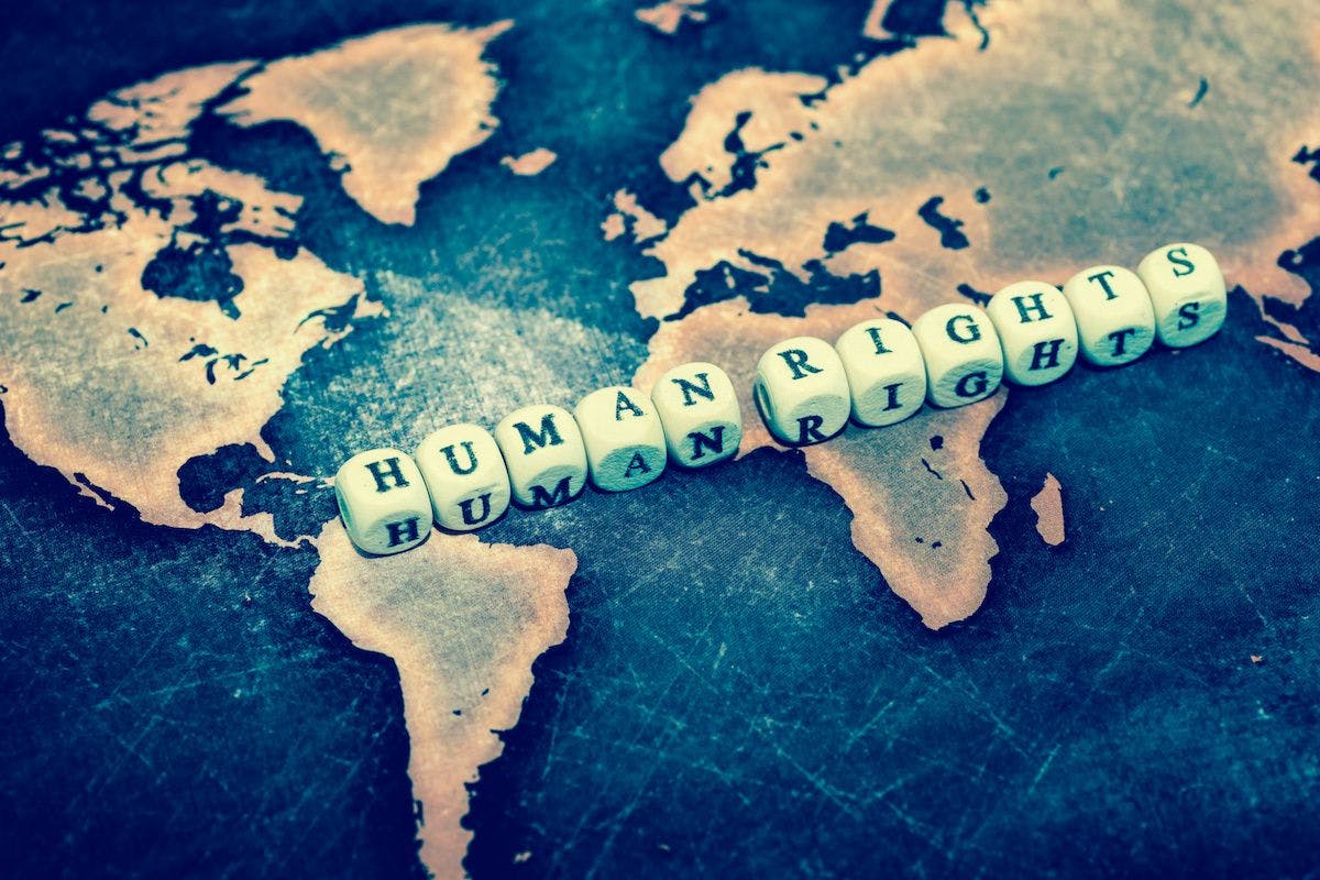 human rights word cubes on map: © Sean K - stock.adobe.com